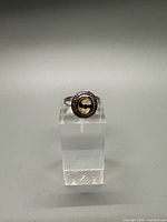 Front view of ring on display stand