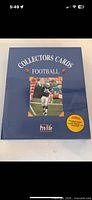 Front of sealed Pro File football collector card binder