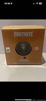 Front of boxed figure with Fortnite logo