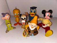 Group shot of all six vinyl figures