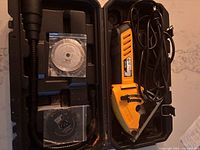 Saw, hose, sealed blades inside molded case