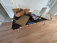 Full view of desk with items on top