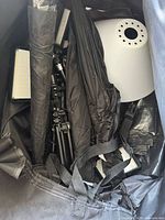 Bag interior showing LED panel, stands, umbrellas, diffuser