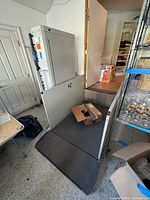 Overall view of Bruno wheelchair lift showing ramp, side panels, and upper landing gate