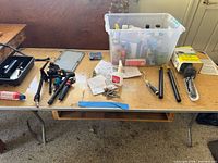 Overall view of table with tools and supplies