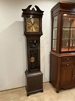 Full view of grandfather clock showing entire case