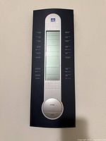 Full front view of wireless forecast station showing display area and control buttons