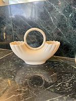 Front angled view of Lenox double wedding vase showing twin bowls and ring handle