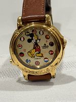 Front view showing dial, case, and strap