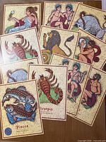 Group shot showing multiple zodiac cards fanned out