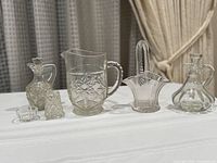 Group shot showing all six cut glass pieces