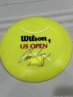 Front view showing Wilson 1 US Open logo and autograph