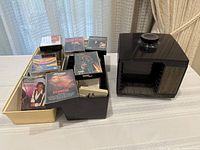 Tray of cassette tapes, black tray of tapes, cube holder