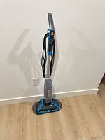 Full view of upright Bissell SpinWave cleaner
