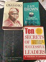 All four books front covers visible