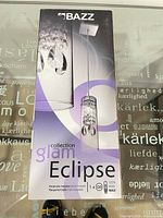 Front of Bazz Eclipse Glam pendant light retail box
