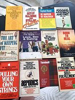 All 12 books laid out, front covers visible