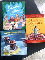 Front covers of all three hardcover books