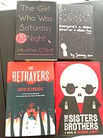 Group shot of all four hardcover books with dust jackets