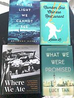 Group shot showing all four hardcover books