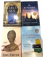 All four book fronts visible