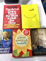 All five books laid out showing covers