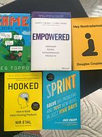 All five hardcover books front covers displayed