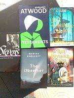 Group shot showing all five hardcover books
