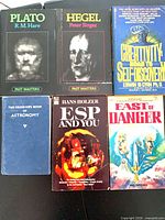 All six books front covers displayed