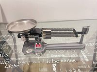 Left side view of balance with pan attached