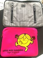 Both sleeves front view showing designs and logos