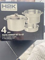 Box front showing image and specs of 4-piece pasta cooker set