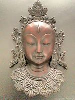 Front view of Tara wall plaque showing full design