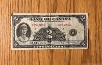 Front of 1935 $2 bill showing portrait, serial A2842055