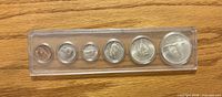 Obverse animal designs of all six 1967 coins in plastic holder