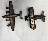 Top view of both die-cast airplane pencil sharpeners