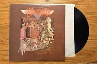 Front jacket, inner sleeve and vinyl disc