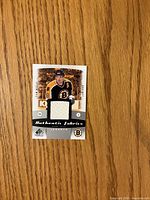 Front of Cam Neely jersey card with fabric swatch visible