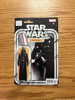 Front cover showing action figure variant art and issue information