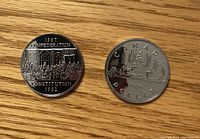 Obverse of both coins showing commemorative reverses