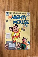 Front cover of Mighty Mouse #82 comic book showing title, character art, issue number and price