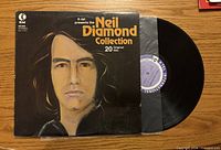 Front cover and record partially removed