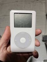 Front view showing click-wheel and screen