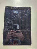 Front of iPad showing black glass screen