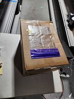 Sealed shipping carton containing six ADT smart home hubs