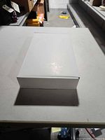 Front of sealed white box