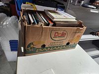 Banana box filled with art books