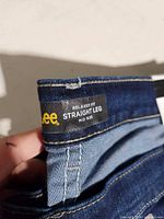 Lee relaxed fit straight leg mid rise waistband label