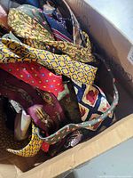 Top view of box showing multiple patterned ties