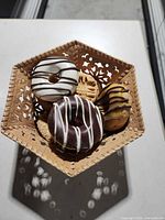 Top view showing donuts, cookies and bowl